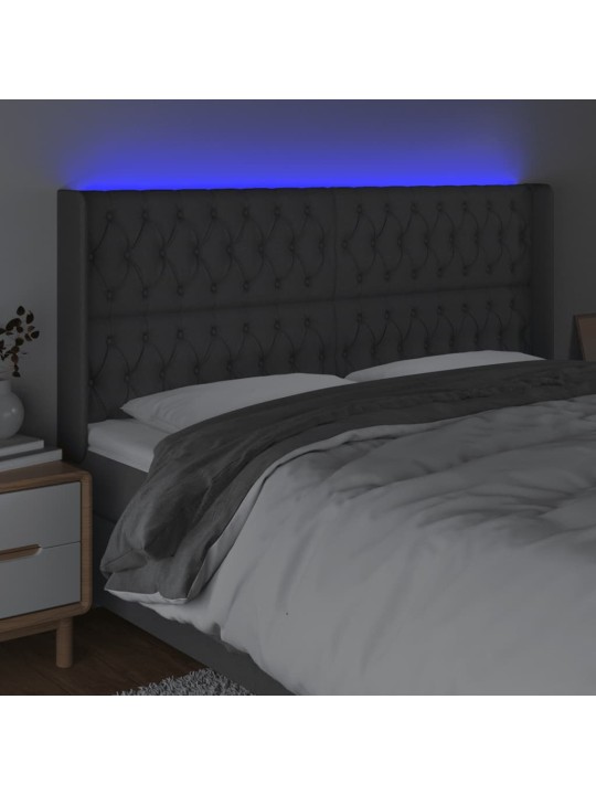 Čelo postele s LED tmavě šedé 203 x 16 x 118/128 cm textil