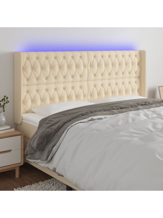Čelo postele s LED krémové 203 x 16 x 118/128 cm textil