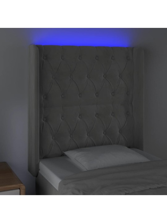 Čelo postele s LED světle šedé 83 x 16 x 118/128 cm samet