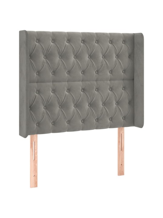 Čelo postele s LED světle šedé 103 x 16 x 118/128 cm samet