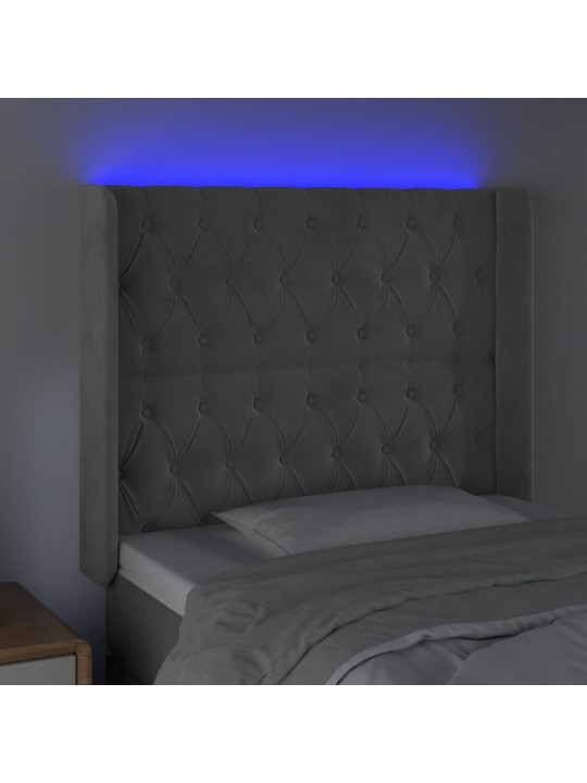 Čelo postele s LED světle šedé 103 x 16 x 118/128 cm samet