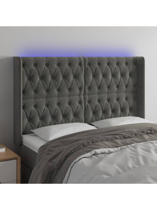 Čelo postele s led tmavě šedé 147 x 16 x 118/128 cm samet