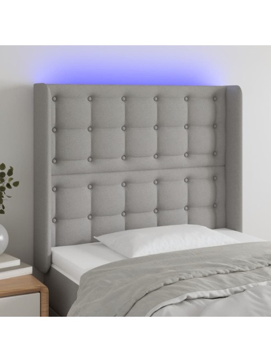 Čelo postele s LED světle šedé 83 x 16 x 118/128 cm textil