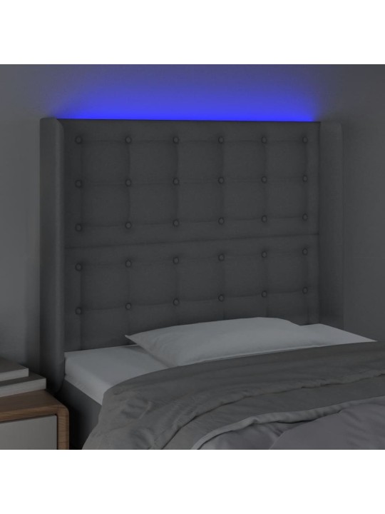 Čelo postele s LED světle šedé 103x16x118/128 cm textil