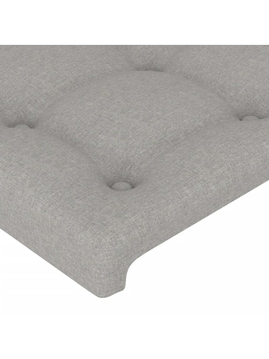 Čelo postele s LED světle šedé 147x16x118/128 cm textil