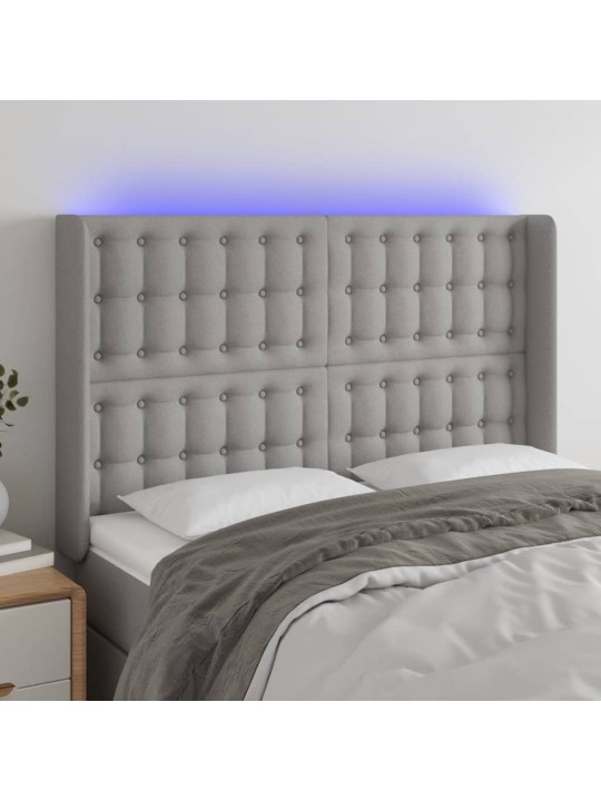 Čelo postele s LED světle šedé 147x16x118/128 cm textil