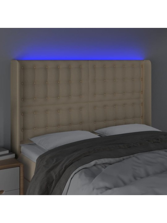 Čelo postele s LED krémové 147 x 16 x 118/128 cm textil