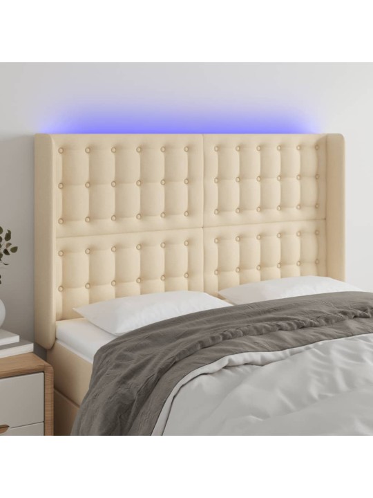 Čelo postele s LED krémové 147 x 16 x 118/128 cm textil