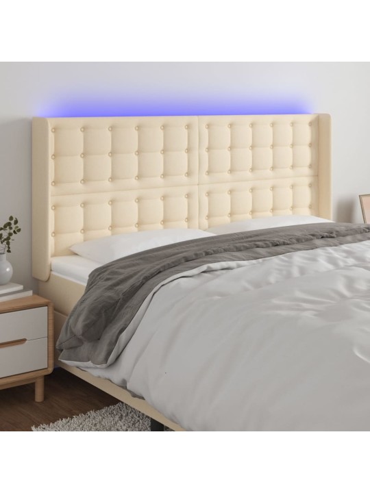 Čelo postele s led krémové 163 x 16 x 118/128 cm textil