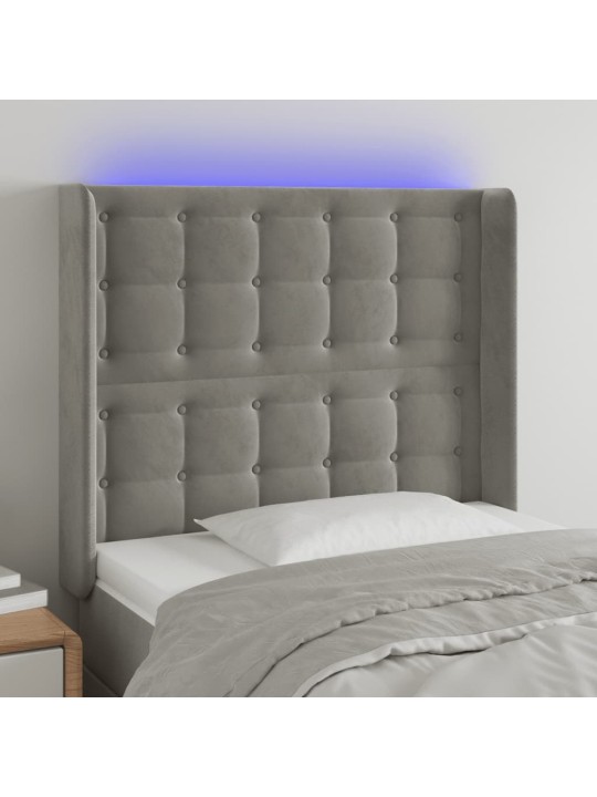Čelo postele s LED světle šedé 103 x 16 x 118/128 cm samet