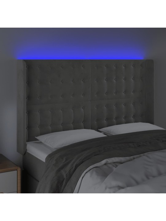 Čelo postele s LED světle šedé 147x16x118/128 cm samet