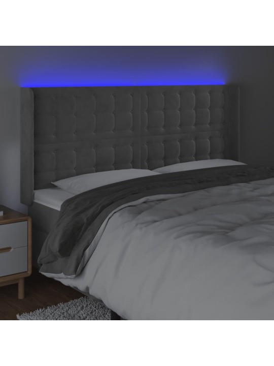 Čelo postele s LED světle šedé 183 x 16 x 118/128 cm samet
