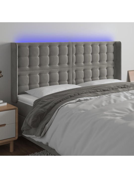 Čelo postele s LED světle šedé 183 x 16 x 118/128 cm samet