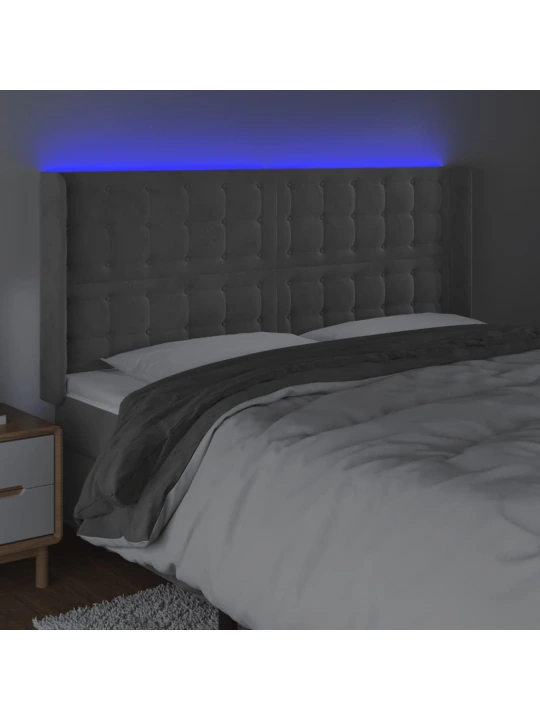 Čelo postele s LED světle šedé 203 x 16 x 118/128 cm samet