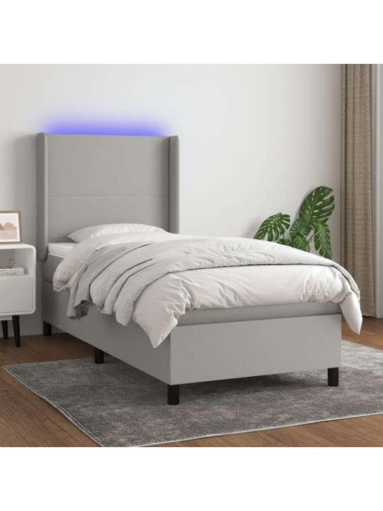 Box spring postel s matrací a LED světle šedá 90x190 cm textil