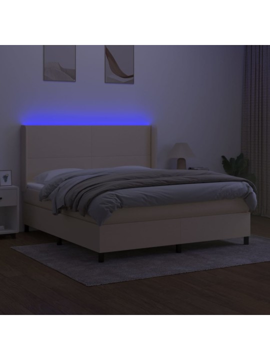 Box spring postel s matrací a led krémová 160x200 cm textil