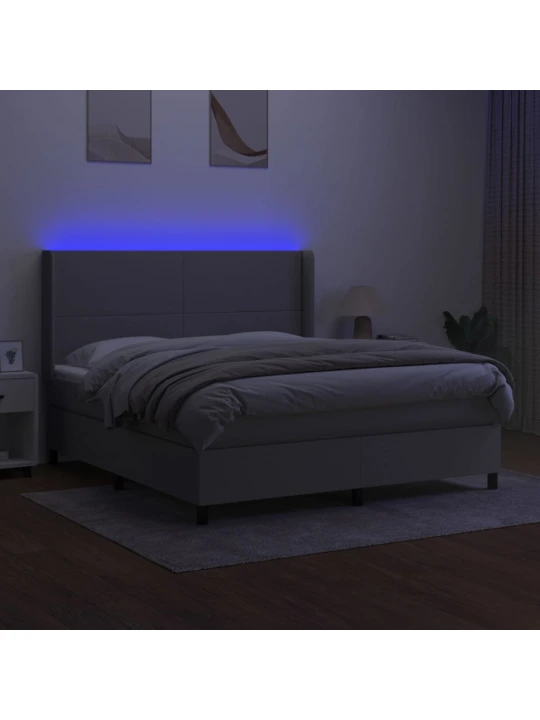 Box spring postel s matrací a LED světle šedá 180x200 cm textil