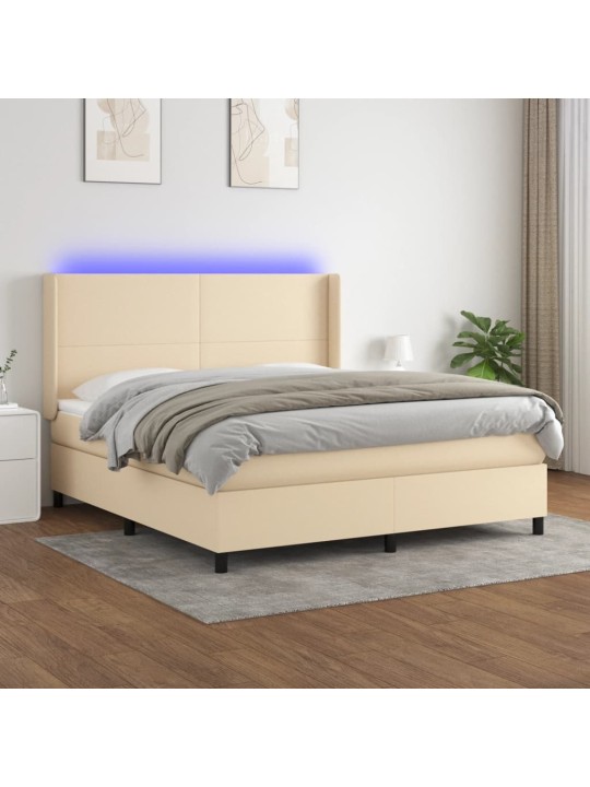 Box spring postel s matrací a led krémová 180x200 cm textil