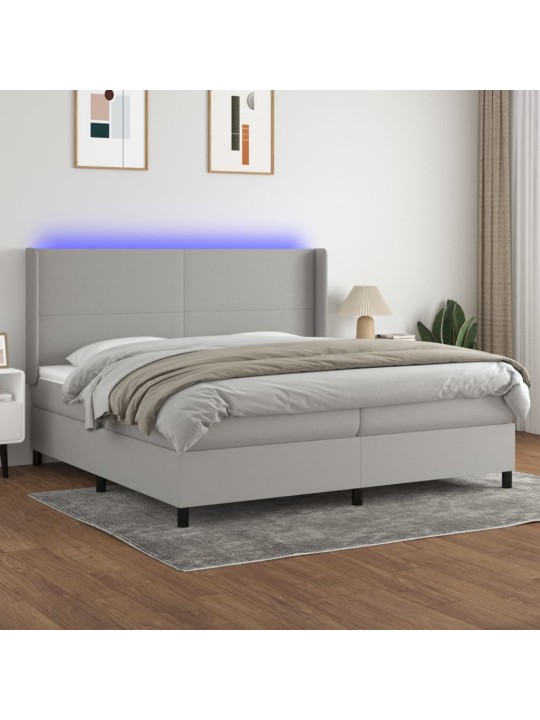 Box spring postel s matrací a LED světle šedá 200x200 cm textil