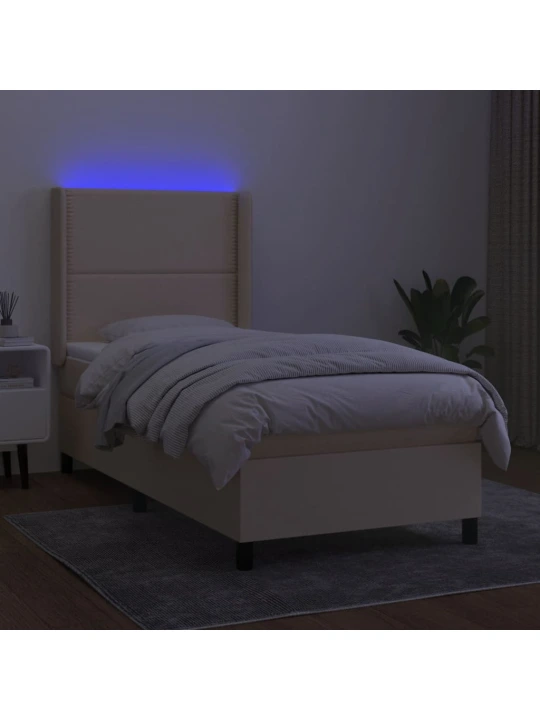Box spring postel s matrací a LED krémová 90x190 cm textil