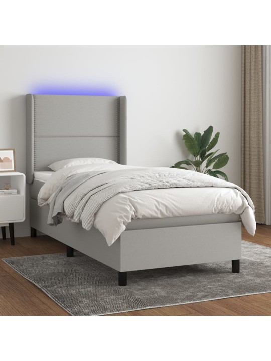 Box spring postel s matrací a LED světle šedá 100x200 cm textil