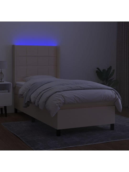 Box spring postel s matrací a LED krémová 90x200 cm textil