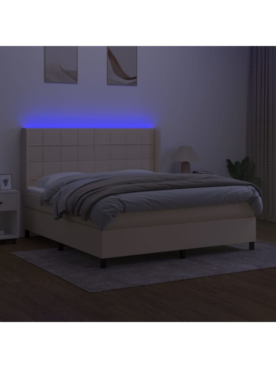 Box spring postel s matrací a led krémová 180x200 cm textil
