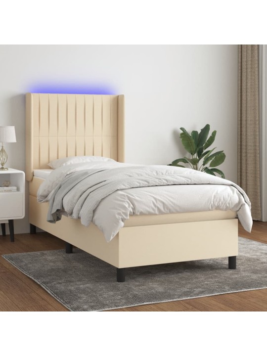 Box spring postel s matrací a LED krémová 90x200 cm textil