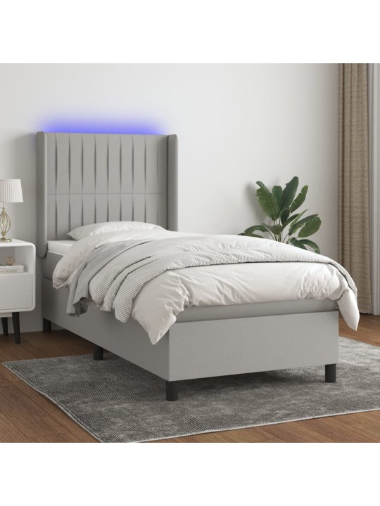 Box spring postel s matrací a LED světle šedá 100x200 cm textil