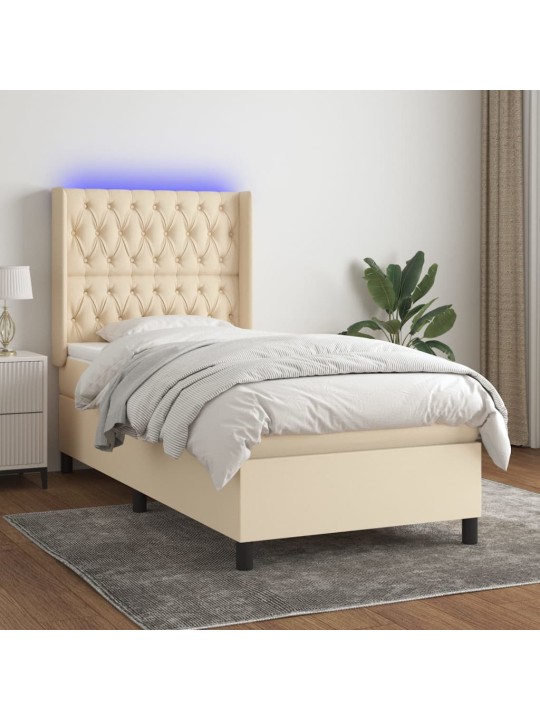Box spring postel s matrací a LED krémová 90x200 cm textil