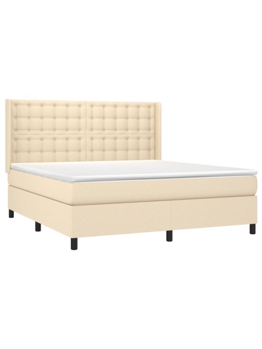 Box spring postel s matrací a LED krémová 180x200 cm textil