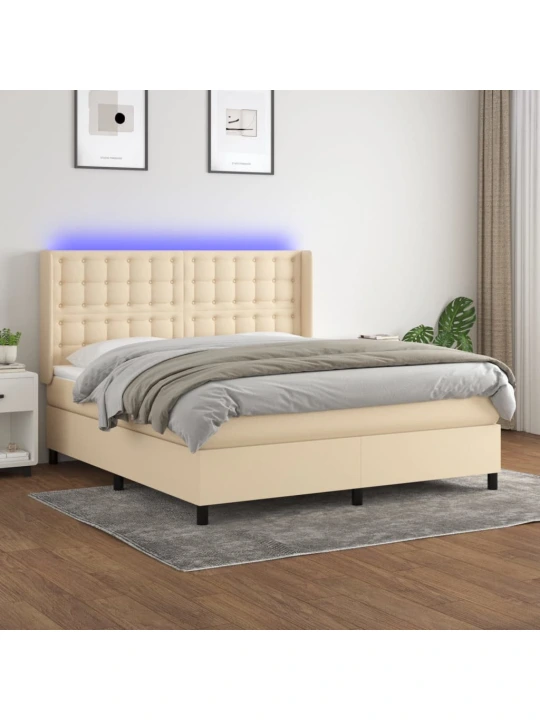 Box spring postel s matrací a LED krémová 180x200 cm textil