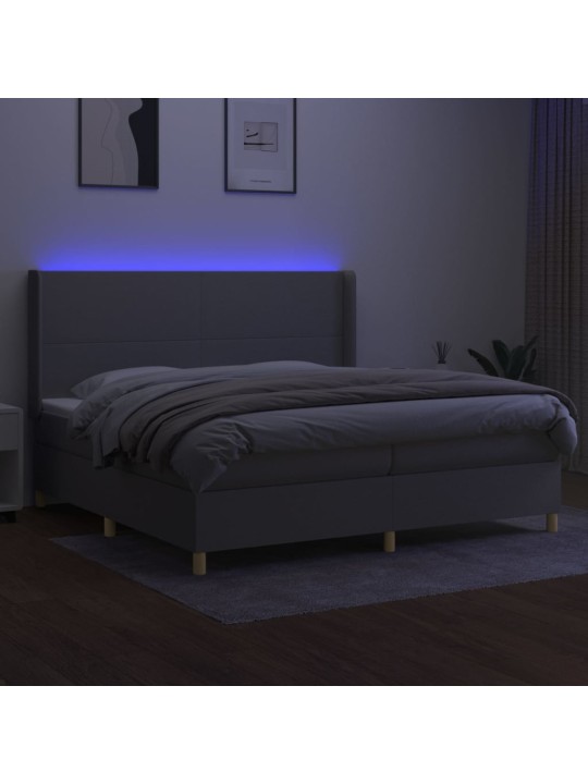 Box spring postel s matrací a LED světle šedá 200x200 cm textil