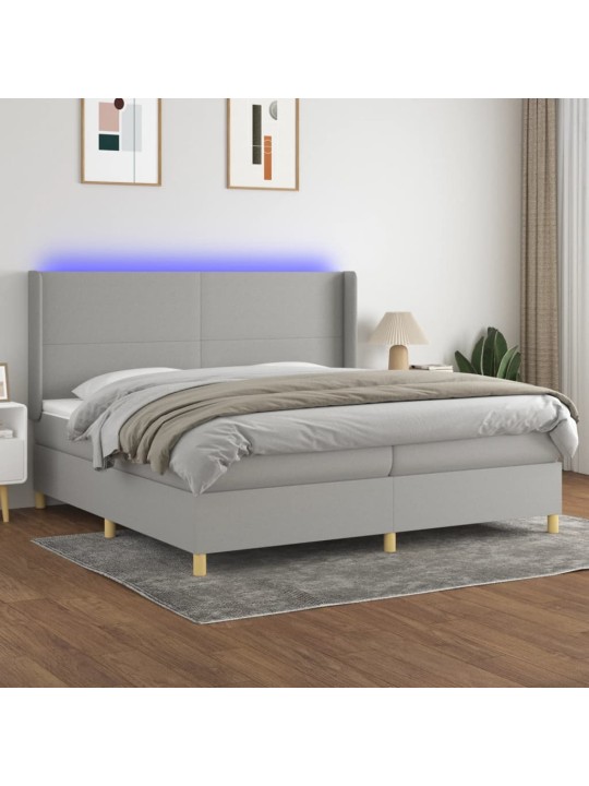 Box spring postel s matrací a LED světle šedá 200x200 cm textil