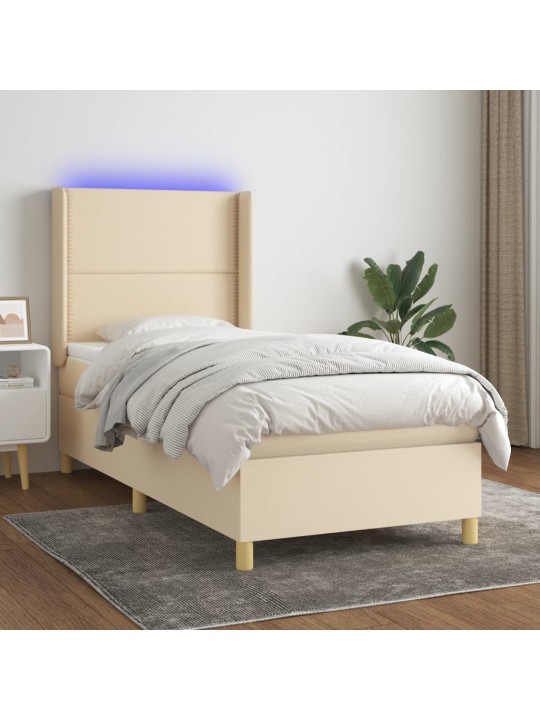 Box spring postel s matrací a LED krémová 90x190 cm textil