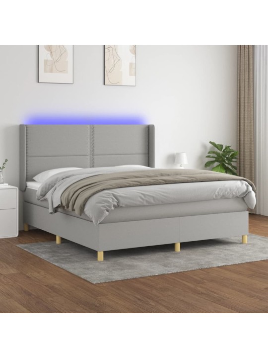 Box spring postel s matrací a LED světle šedá 180x200 cm textil