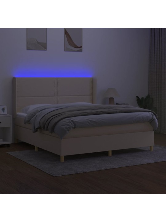 Box spring postel s matrací a LED krémová 180x200 cm textil