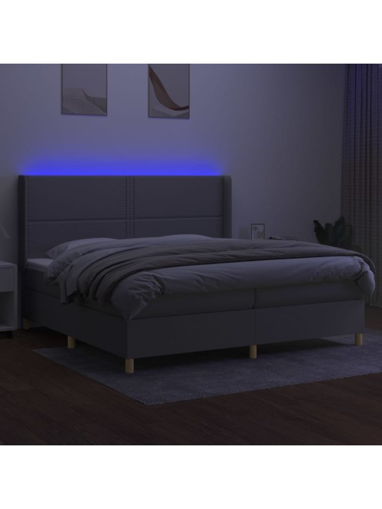 Box spring postel s matrací a LED světle šedá 200x200 cm textil