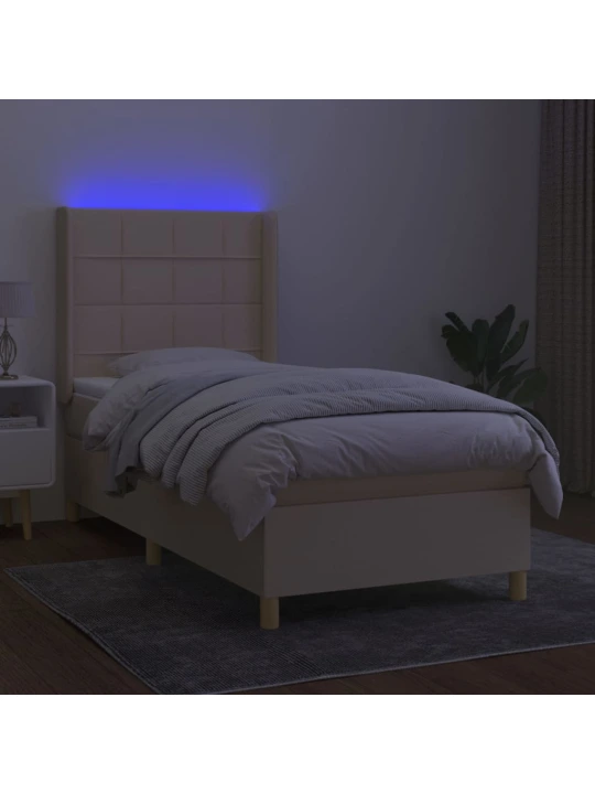 Box spring postel s matrací a LED krémová 90x200 cm textil