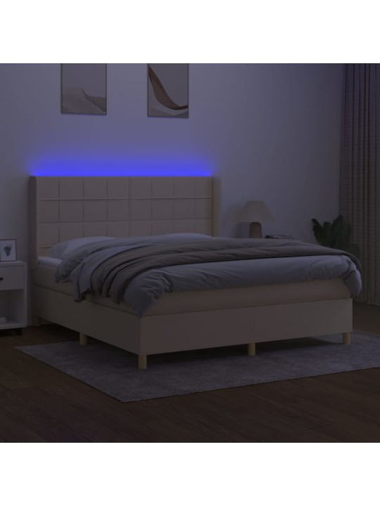 Box spring postel s matrací a led krémová 180x200 cm textil
