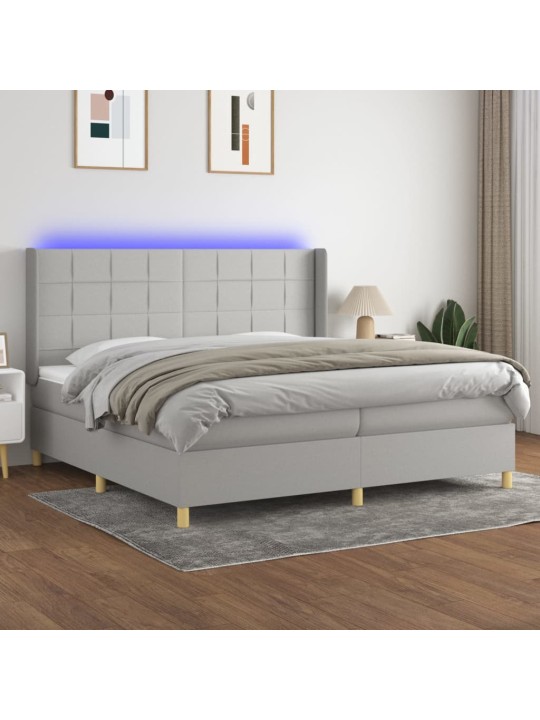Box spring postel s matrací a LED světle šedá 200x200 cm textil