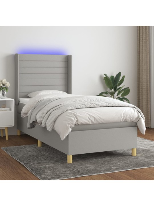Box spring postel s matrací a LED světle šedá 100x200 cm textil