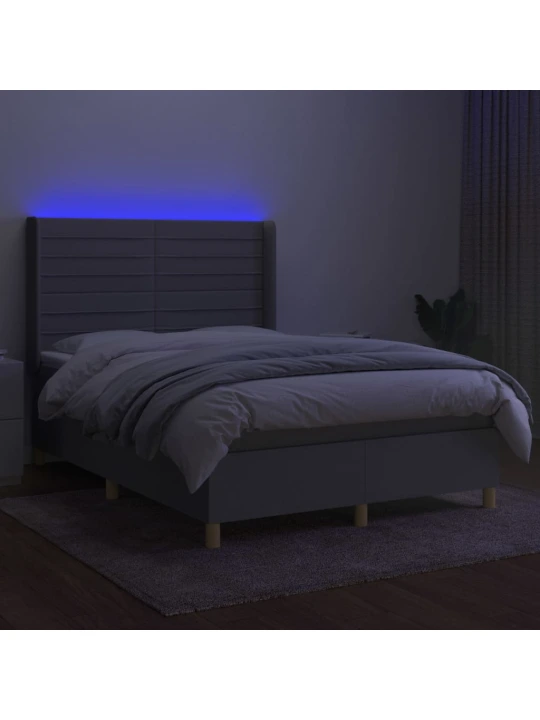 Box spring postel s matrací a LED světle šedá 140x200 cm textil