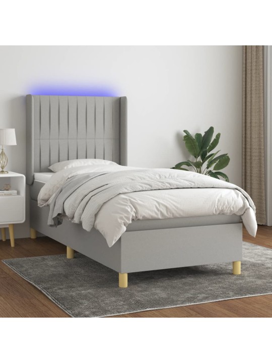 Box spring postel s matrací a LED světle šedá 90x200 cm textil