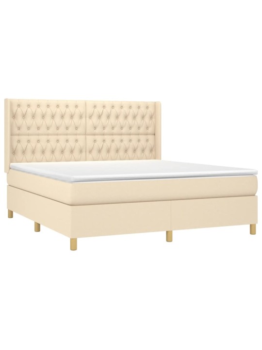 Box spring postel s matrací a led krémová 180x200 cm textil
