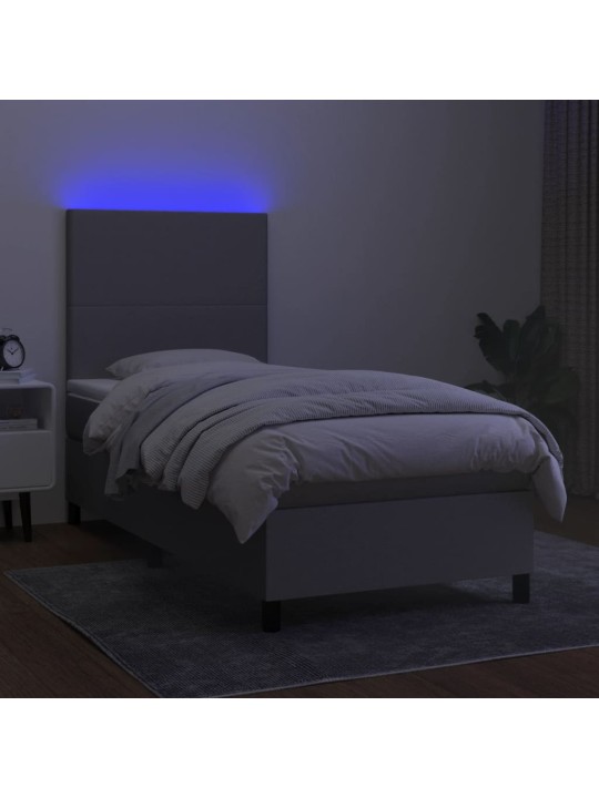 Box spring postel s matrací a LED světle šedá 90x200 cm textil