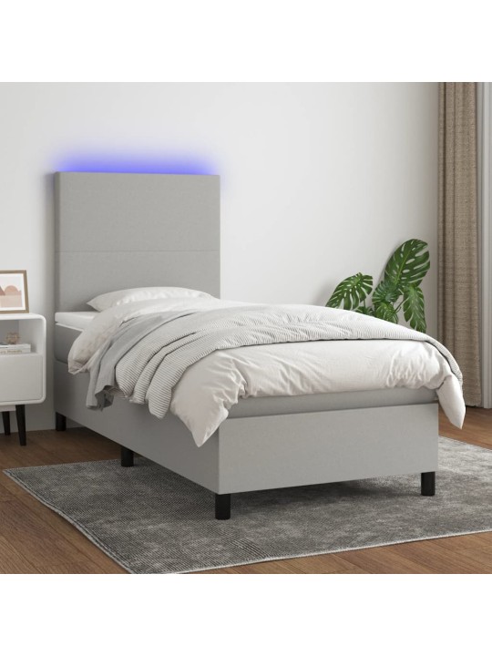 Box spring postel s matrací a LED světle šedá 90x200 cm textil