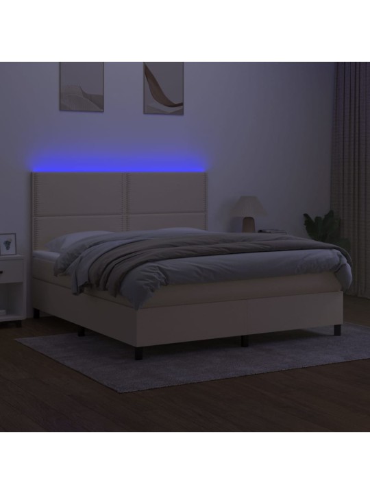 Box spring postel s matrací a LED krémová 180x200 cm textil