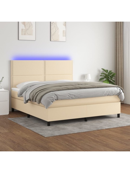 Box spring postel s matrací a LED krémová 180x200 cm textil