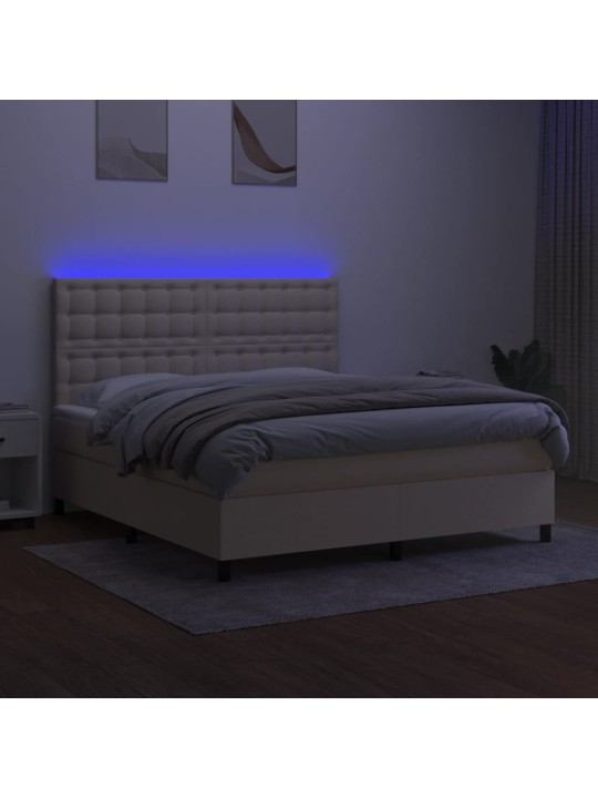 Box spring postel s matrací a LED krémová 180x200 cm textil